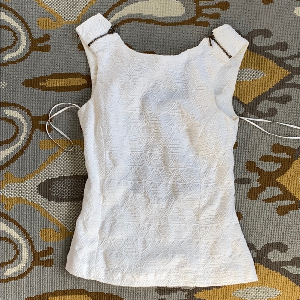Ivory top with cutout back and shoulder zippers